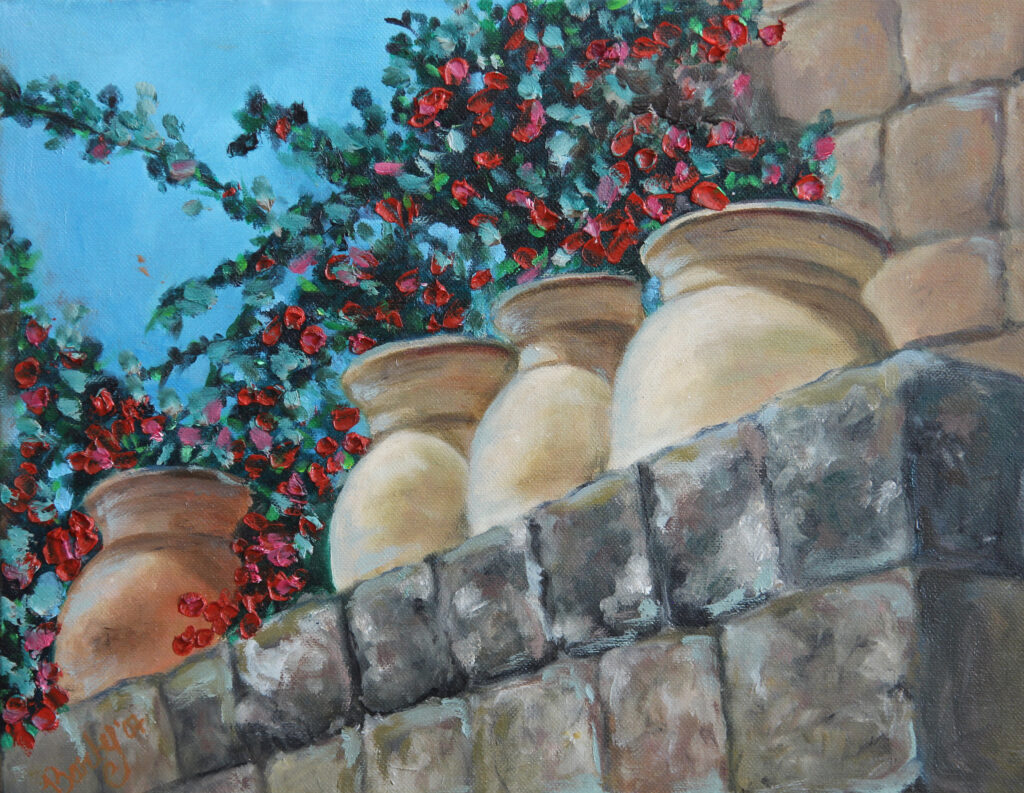 Pots on stone wall